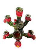 Candelabro de Nopal de barro vidriado decorando un ambiente elegante, representando el arte popular michoacano y el empoderamiento de las mujeres artesanas de Mansión Iturbe Artisans Collection