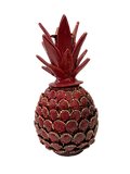 Piña de barro vidriado en color rojo y blanco crudo con técnica de conchita, hecha por una mujer artesana de Michoacán